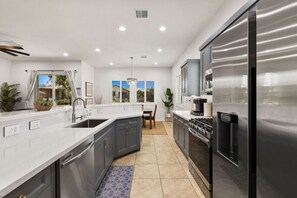 Fridge, microwave, oven, stovetop - Indio Oasis a Private Pool Home by Rather Be Properties (Indio)