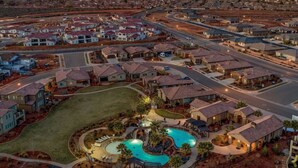 A residential area with houses, roads, and a large mountain in the background. - Paradise Village 55 with Pool Water Park & Hot Tub

 (Santa Clara)