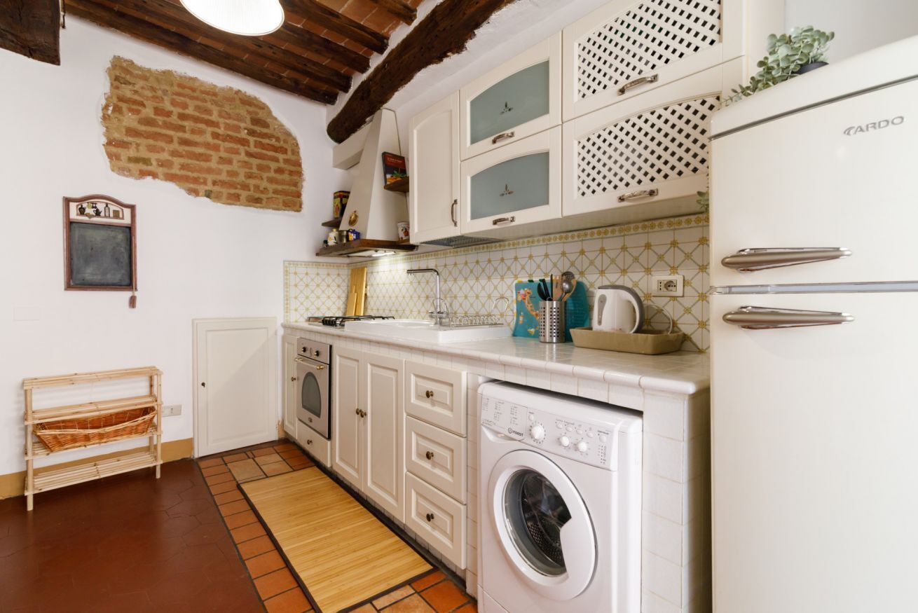 Frigorifero, forno, piano cottura, tostapane