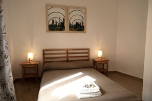 3 habitaciones, tabla de planchar con plancha, wifi y ropa de cama 