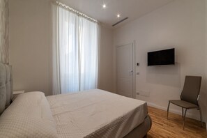 3 habitaciones, tabla de planchar con plancha, wifi y ropa de cama
