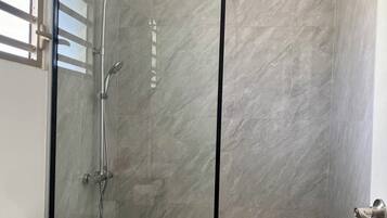 Shower, free toiletries, towels, soap