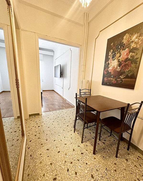 Apartment, Balcony, City View | Living area | Flat-screen TV