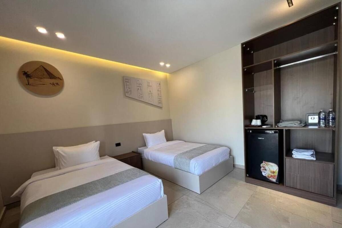 Family Triple Room, Mountain View | In-room safe, iron/ironing board (on request), WiFi (free)