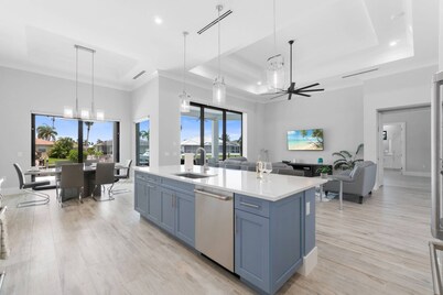 New Construction, Immaculate Canal Home; Wide Water Views, Pool, Spa, Dock & More ~Great Location!