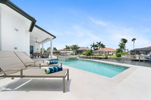 A heated pool - New Construction, Immaculate Canal Home; Wide Water Views, Pool, Spa, Dock & More ~Great Location! (Marco Island)