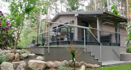 Ferienhaus 'Am Kiefernweg 1' mit Seeblick, privater Terrasse und eigenem Garten