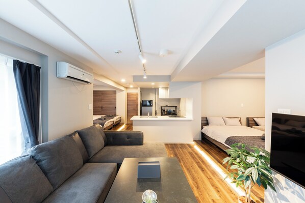 Basic Apartment | Living area | Flat-screen TV