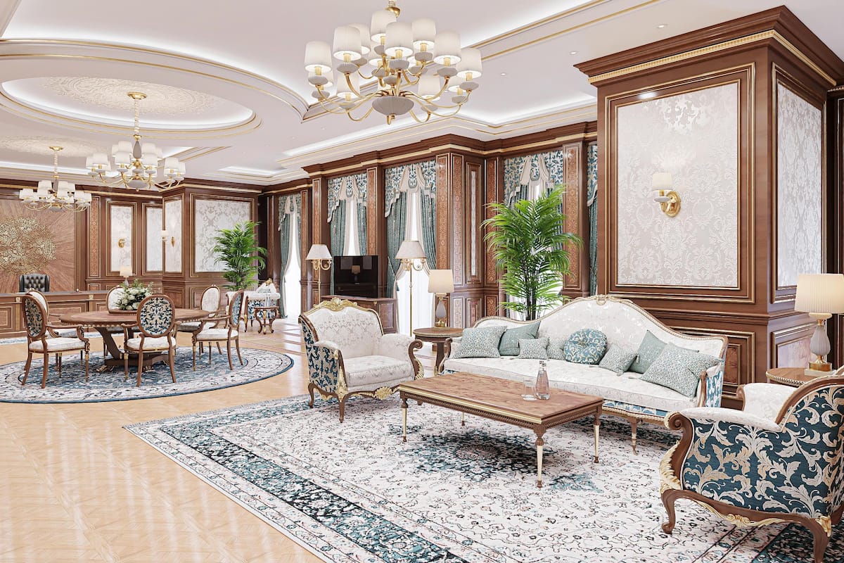 A luxurious living room with a grand chandelier, elegant furniture, and ornate wall decorations.