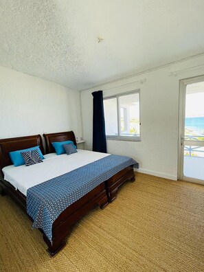 1 bedroom, desk, iron/ironing board, travel crib