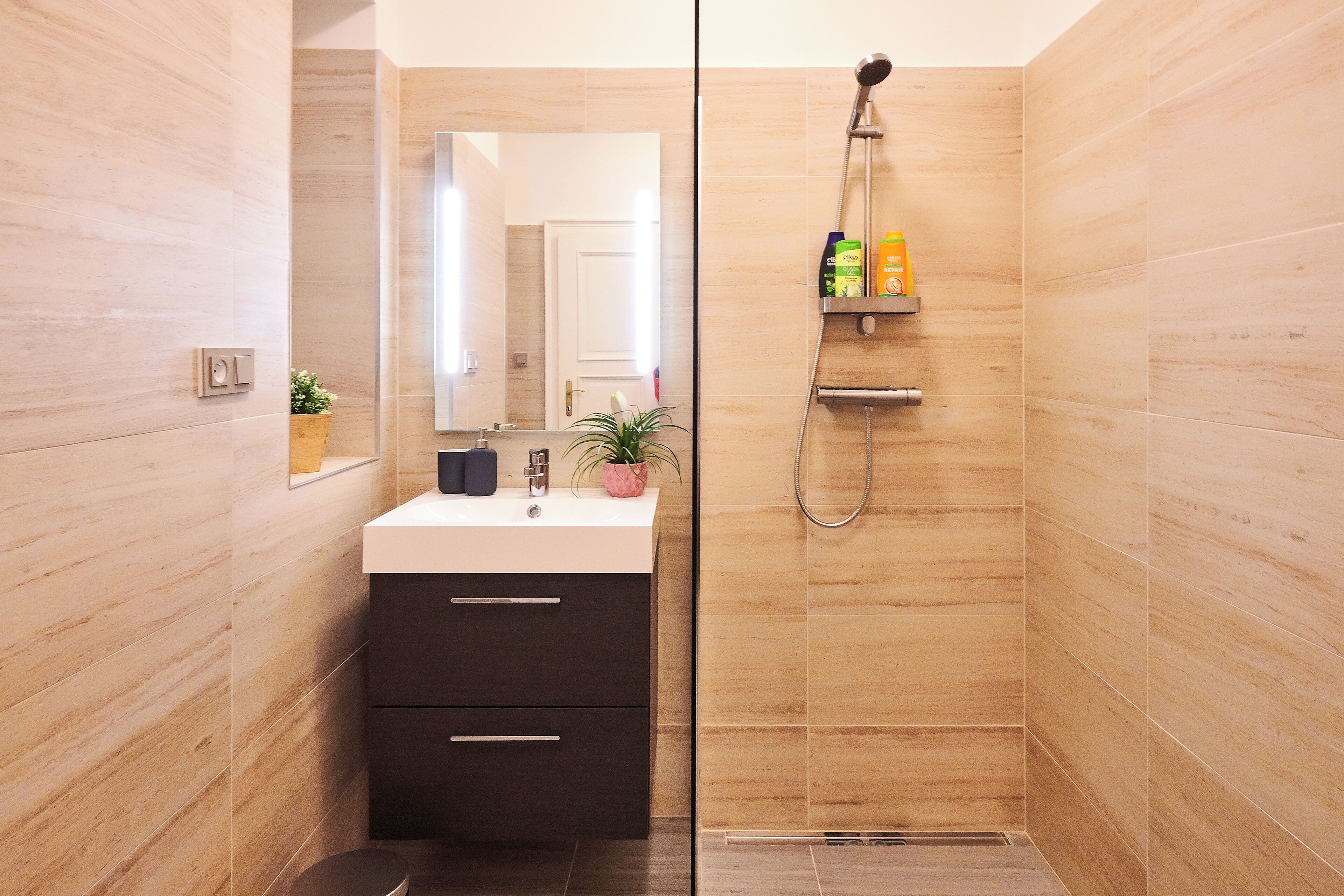 Hair dryer, towels, soap, shampoo