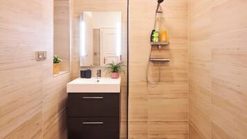 Hair dryer, towels, soap, shampoo