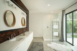 Eco-friendly toiletries, hair dryer, towels