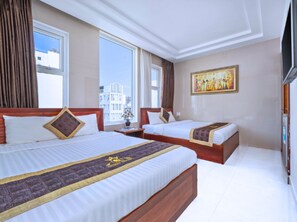 Panoramic Quadruple Room, 2 Queen Beds | Hypo-allergenic bedding, memory foam beds, minibar - Dubai Hotel (Da Nang)