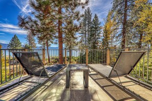 Terrace/patio - Spellbound Lakefront Lodge by Tahoe Getaways - 5 BR w Hot Tub, Buoy & Beach Access (Kings Beach)