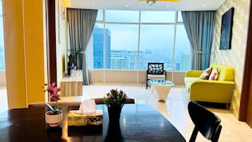 Deluxe Apartment, City View | Living area | Fireplace