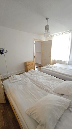 2 bedrooms, travel crib, WiFi, bed sheets