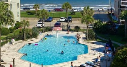 Clair's Getaway-Coastal Condo with a Gorgeous Beach and Pool View!