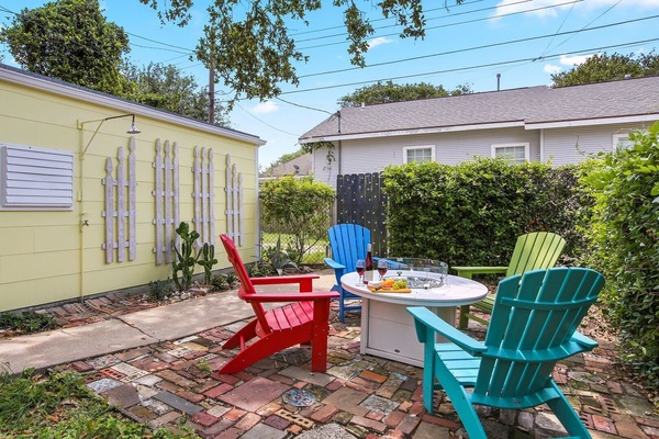 This lovely backyard has it all including a propane fire pit!