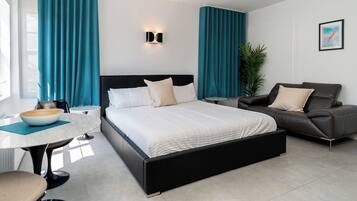 1 غرفة نوم ومكواة/لوح كي وواي فاي وملاءات أسرّة