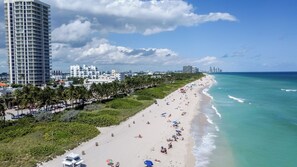On the beach, sun-loungers, beach towels