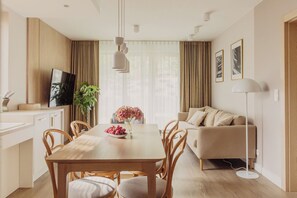 Appartement Premium, accessible aux personnes à mobilité réduite, cÎté jardin | Coin séjour