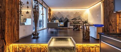 Comfort Condo, Balcony | Living area | 42-inch flat-screen TV with satellite channels, TV, toys