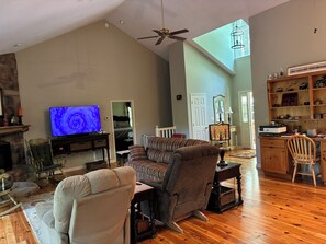 Smart TV, fireplace, DVD player, books