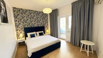 Apartemen Comfort, balkon | 1 kamar tidur, tirai kedap cahaya, dan setrika/meja setrika