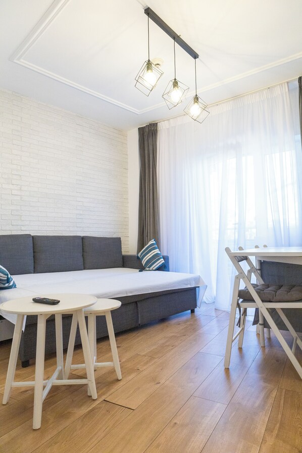 Comfort Apartment, Balcony | Living area