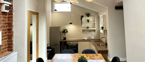 Deluxe Loft | Living area | TV