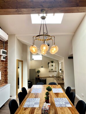 Deluxe-Loft | Wohnbereich | Fernseher