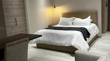 Signature Studio Suite | Premium bedding, down comforters, Select Comfort beds, desk