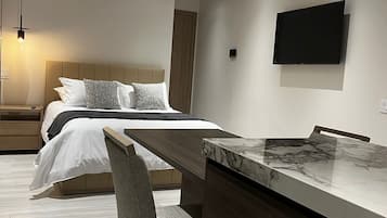 Signature Studio Suite | Premium bedding, down comforters, Select Comfort beds, desk
