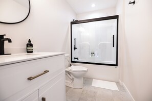 Hair dryer, towels, soap, shampoo
