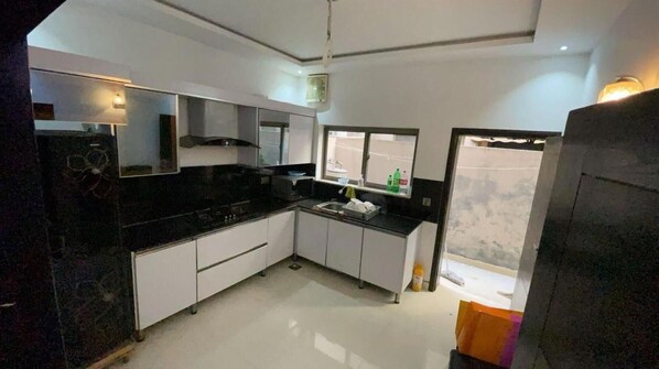 Villa | Private kitchen | Fridge, microwave, stovetop, electric kettle