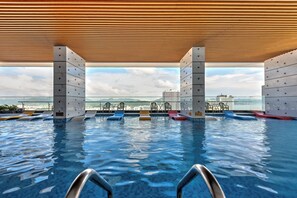 Indoor pool, open 6:30 AM to 9:30 PM, pool umbrellas, pool loungers - S Lux Apartment Virgo Nha Trang (Nha Trang)