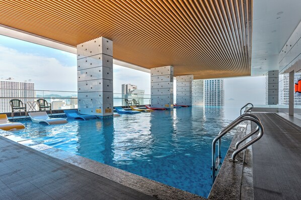 Indoor pool, open 6:30 AM to 9:30 PM, pool umbrellas, pool loungers - S Lux Apartment Virgo Nha Trang (Nha Trang)