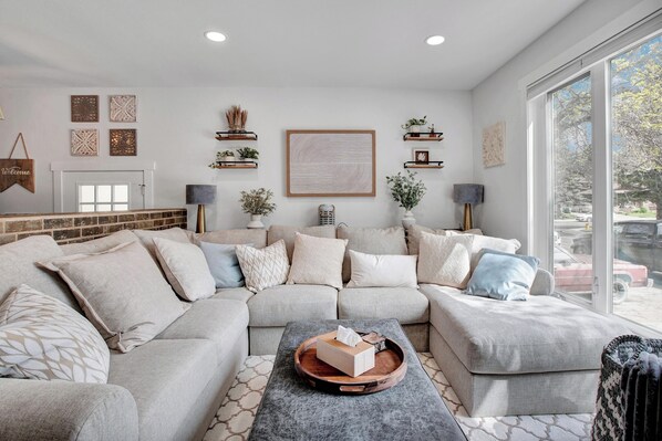 Smart TV, fireplace, foosball, books