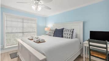 1 bedroom, desk, iron/ironing board, travel crib