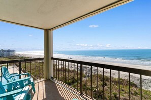 A balcony with a view of the beach and ocean. - 3 Bdrm @ Sea marsh II-pool- corner oceanfront view (North Myrtle Beach)