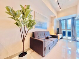 City Apartment, City View | Living area | 50-inch Smart TV with digital channels, Netflix, streaming services