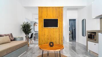 Superior Studio | Living area | 55-inch Smart TV with satellite channels