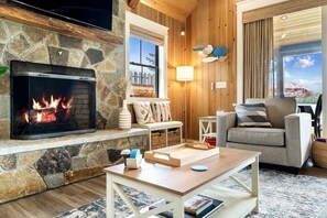 Una Smart TV, una chimenea, videojuegos, una oficina