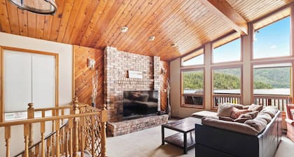 Cozy Beach Front getaway, with mountains and lake views all around.