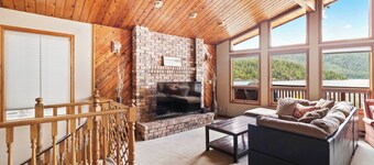 Cozy Beach Front getaway, with mountains and lake views all around.