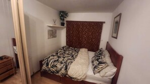1 habitación, tabla de planchar con plancha, wifi y ropa de cama 