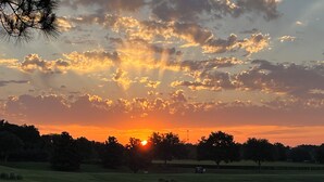 A golf course with a sunset in the background. -  Sunsets on the Sands in the Villages! Golf Front  3/2 (The Villages)