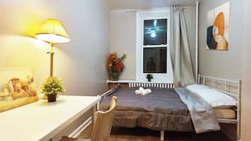 2 habitaciones, escritorio, wifi gratis y ropa de cama