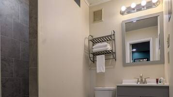 Shower, hair dryer, towels, soap